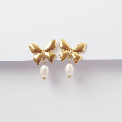 Κρεμαστά σκουλαρίκια με πεταλούδα και μαργαριτάρια